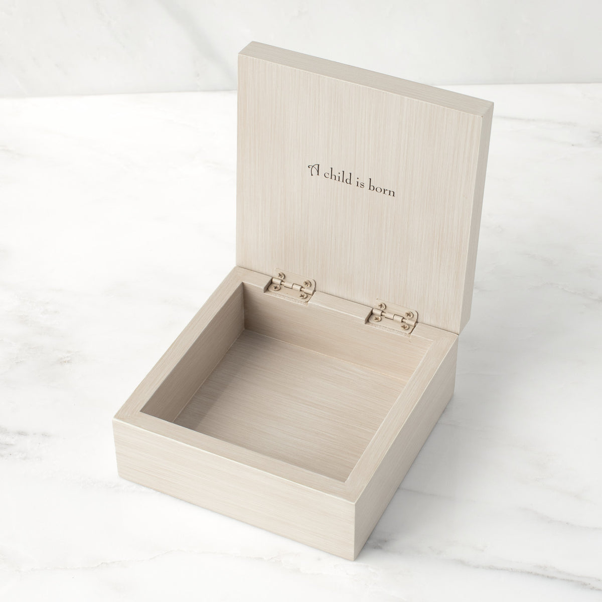 Inside view: cream square wood box with sentiment written on inside of hinged lid