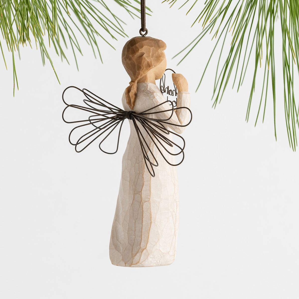 Back view female angel figure with wire wings holding wire circle with "thank you" written in wire inside of it, ornament loop on figure's head