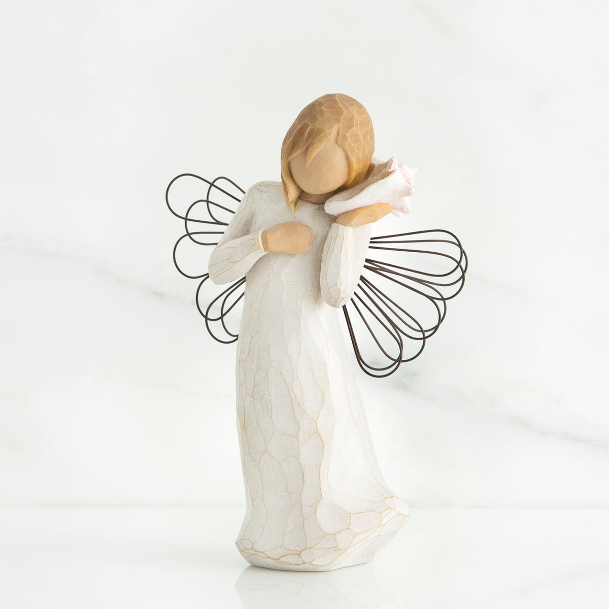Blonde faceless girl holding white shell to her ear wearing white dress and black wire angel wings
