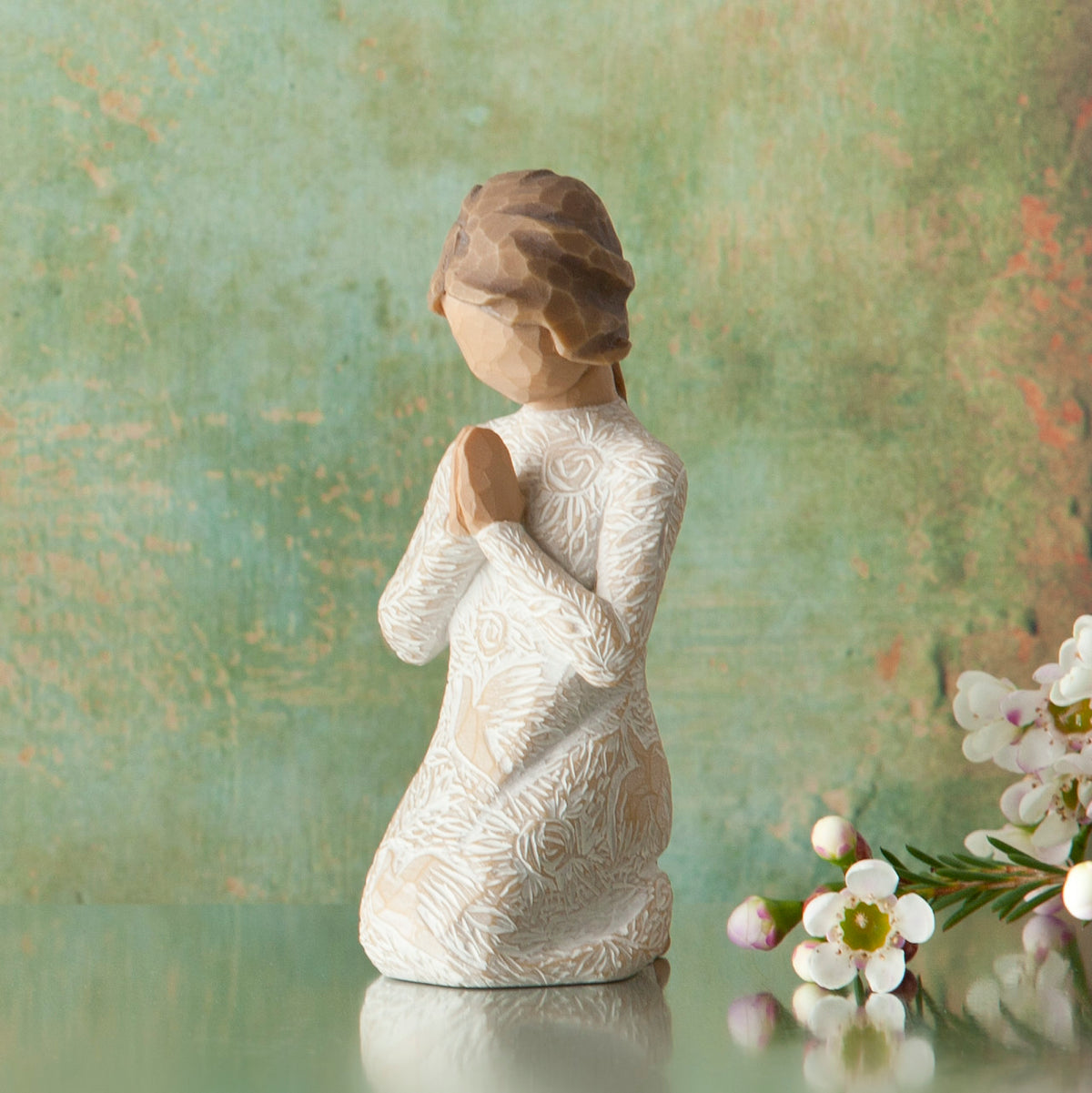 Willow Tree Prayer of Peace, 4”h hand-painted kneeling figure in cream dress heavily carved with birds and flowers, hands in prayer pose, in front of moss green painting
