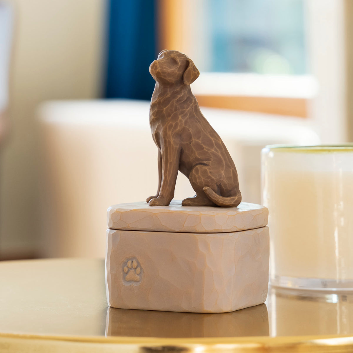 Willow Tree Love my Dog (dark) Keepsake Box, 3"w x 3.25”d hand-painted resin box with 3.4”H carved figure of golden dog affixed to lid, on coffee table