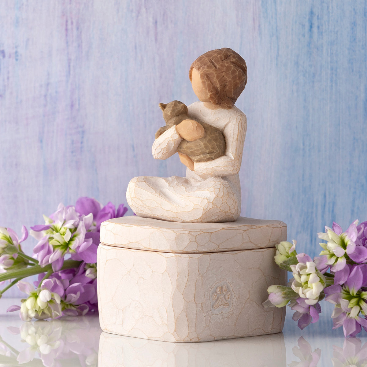 Willow Tree Kindness (girl) Keepsake Box, 3"sq hand-painted cream resin box with 3”H figure of seated girl holding cat affixed to lid, in front of purple-blue painting